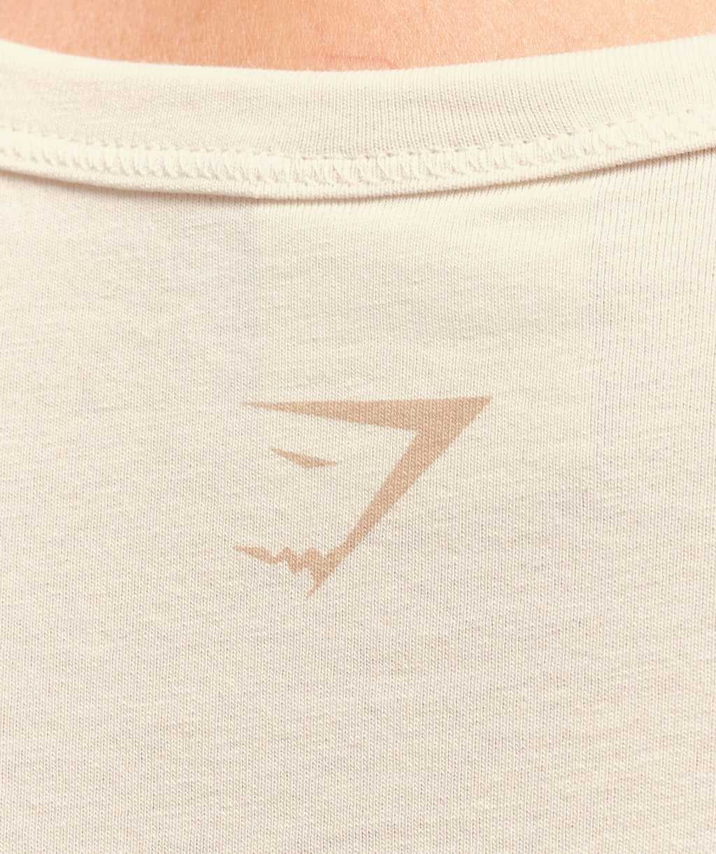 gymshark-cotton-graphic-midi-t-shirt-oat-white-ss25