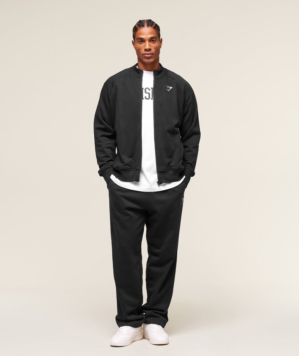 gymshark-crest-oversized-track-jacket-jackets-outerwear-black-aw25