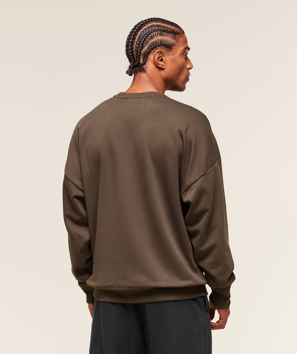gymshark-crest-oversized-crew-pullovers-brown-aw25