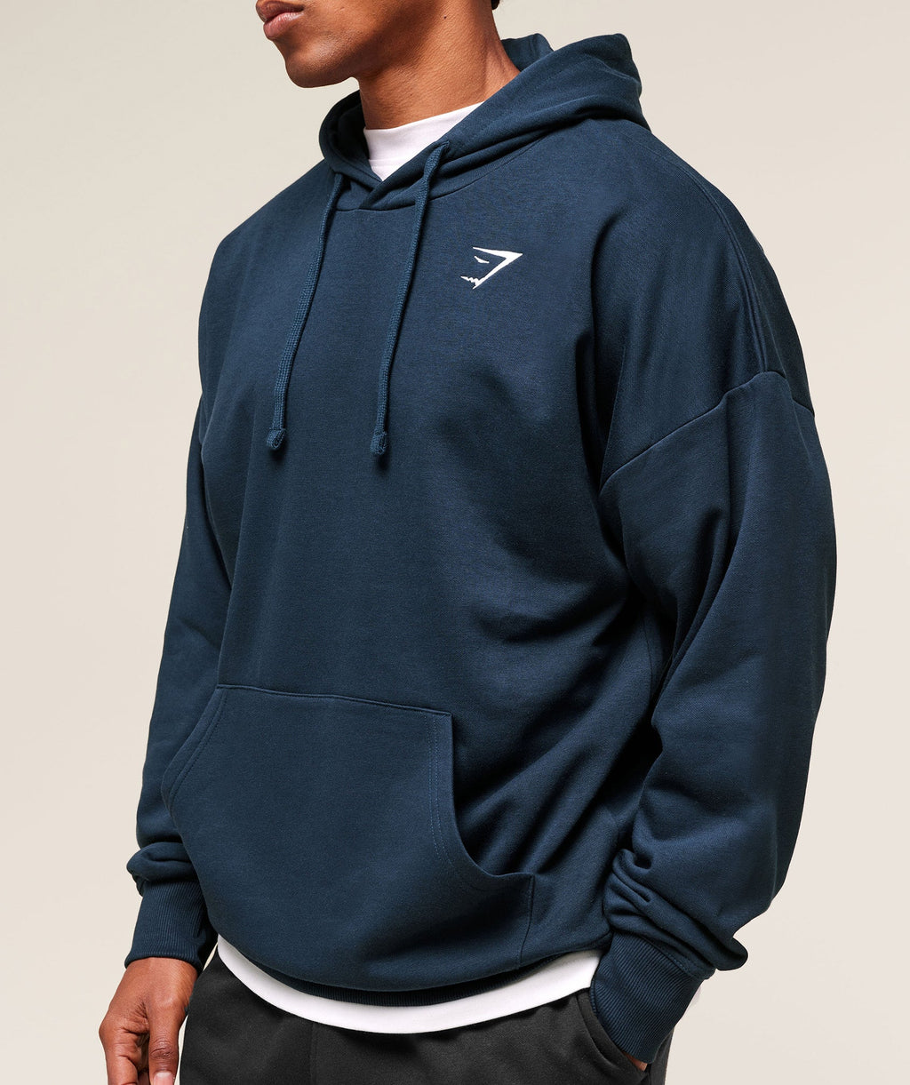 gymshark-crest-oversized-hoodie-navy-ss24