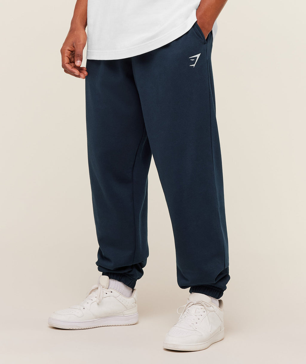 gymshark-crest-oversized-jogger-pants-blue-ss26