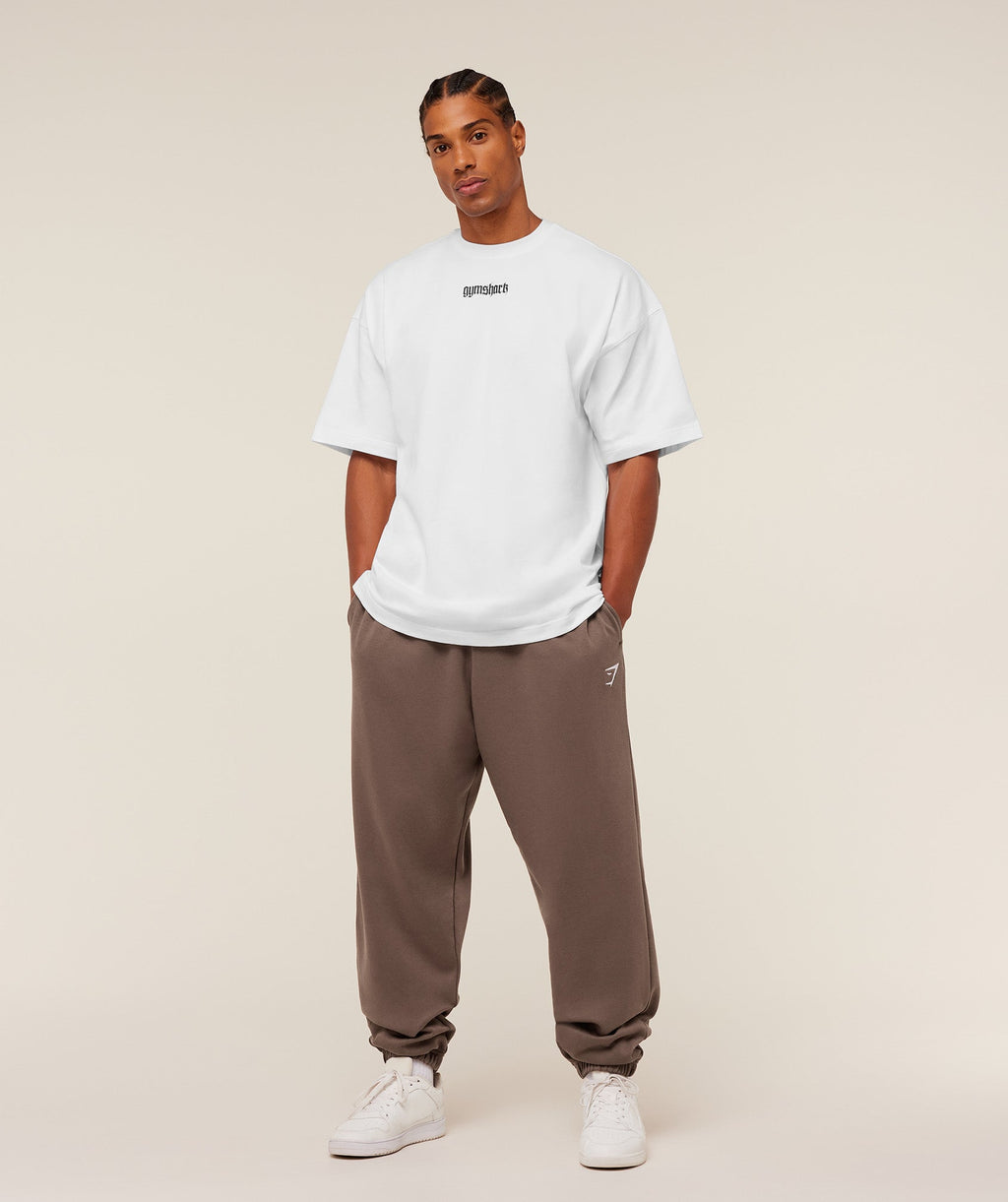gymshark-crest-oversized-jogger-pants-brown-ss26