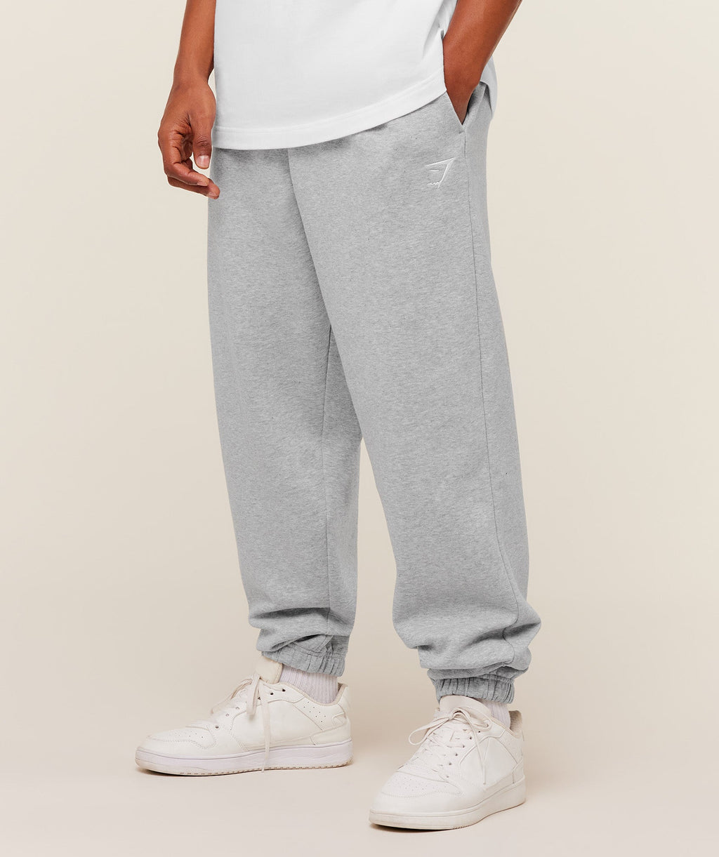 gymshark-crest-oversized-jogger-pants-grey-ss26
