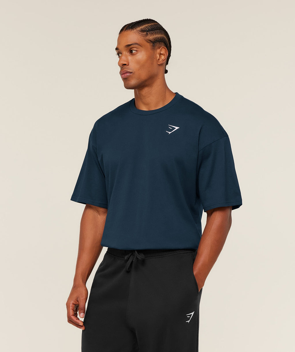 gymshark-crest-oversized-t-shirt-ss-tops-blue-ss26