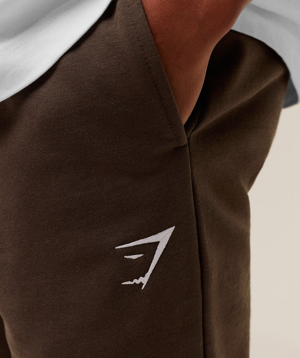 gymshark-crest-joggers-pants-brown-aw25