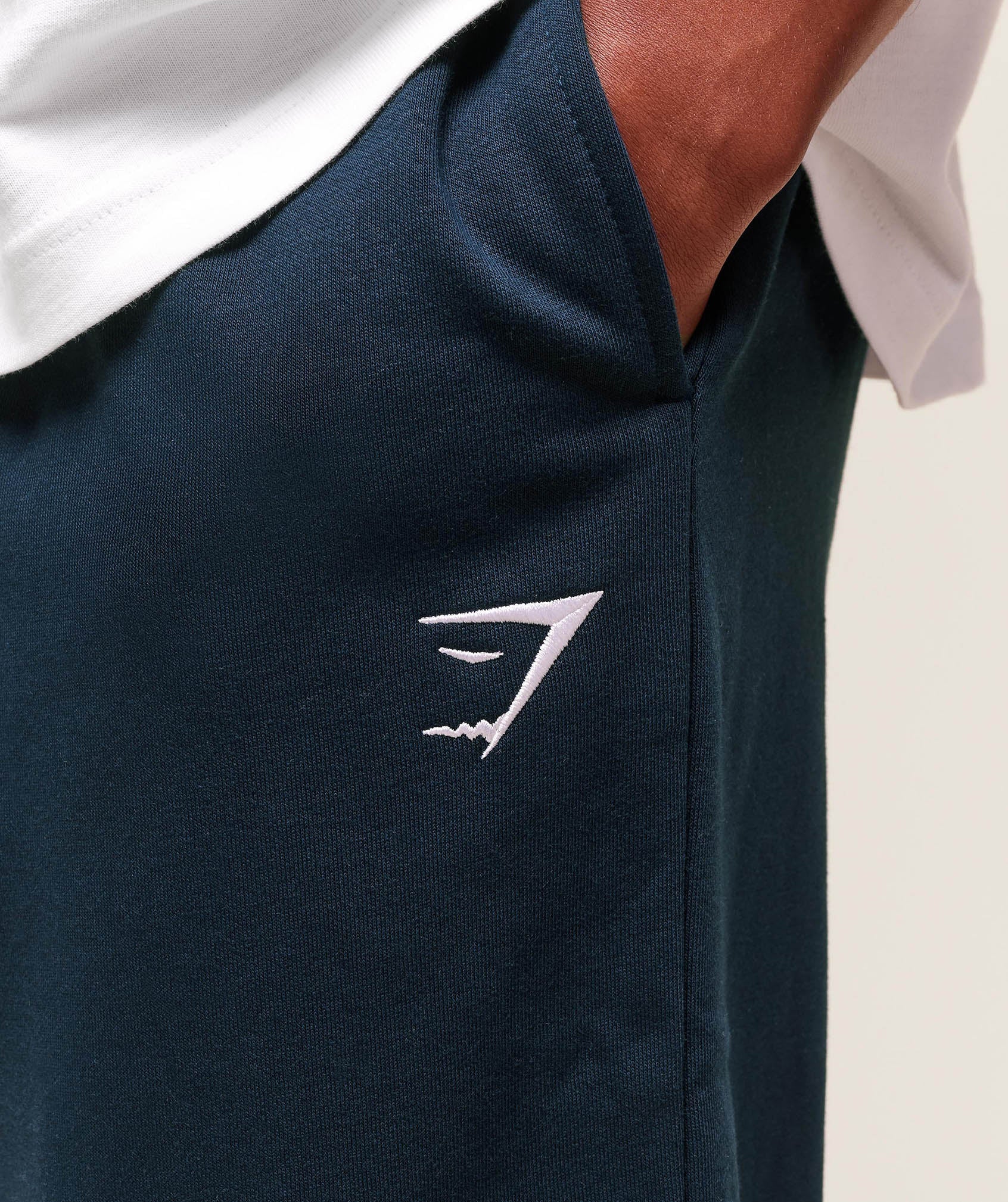 gymshark-crest-straight-leg-joggers-navy-ss24