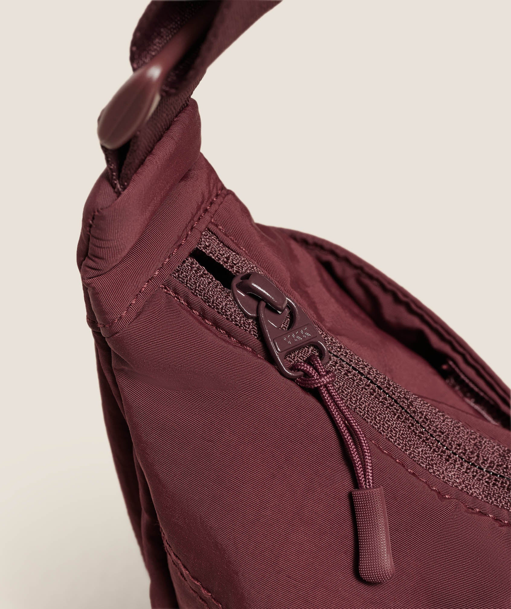 gymshark-pleat-crossbody-bags-brown-aw25