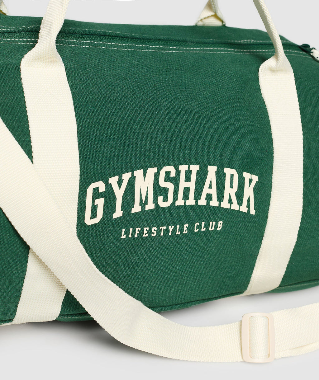 gymshark-collegiate-canvas-duffle-bags-green-ss25