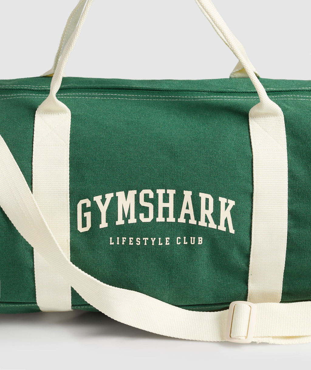 gymshark-collegiate-canvas-duffle-bags-green-ss25