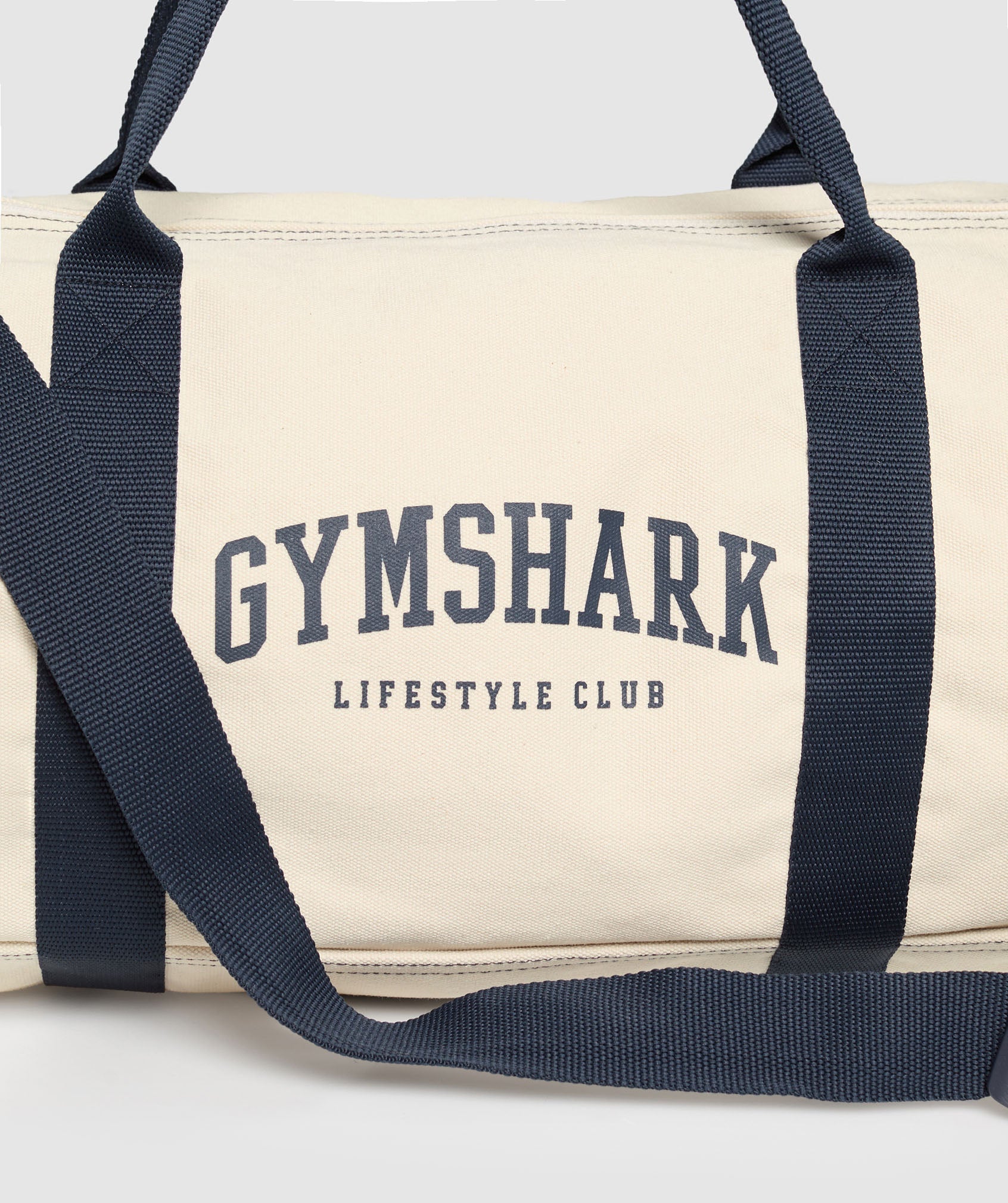 gymshark-collegiate-canvas-duffle-bags-blue-ss25
