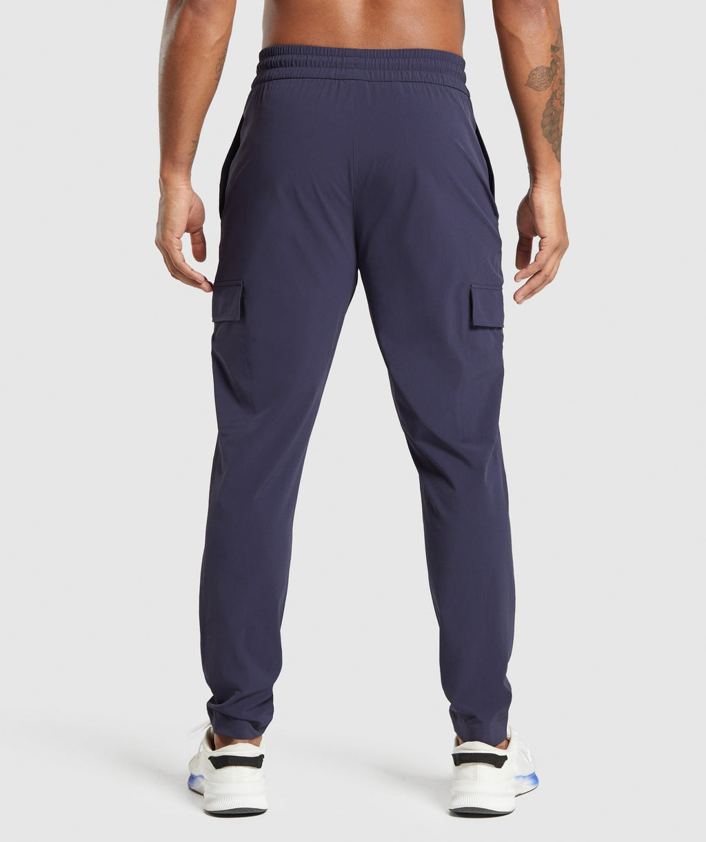 gymshark-stretch-woven-cargo-pants-pants-blue-ss25