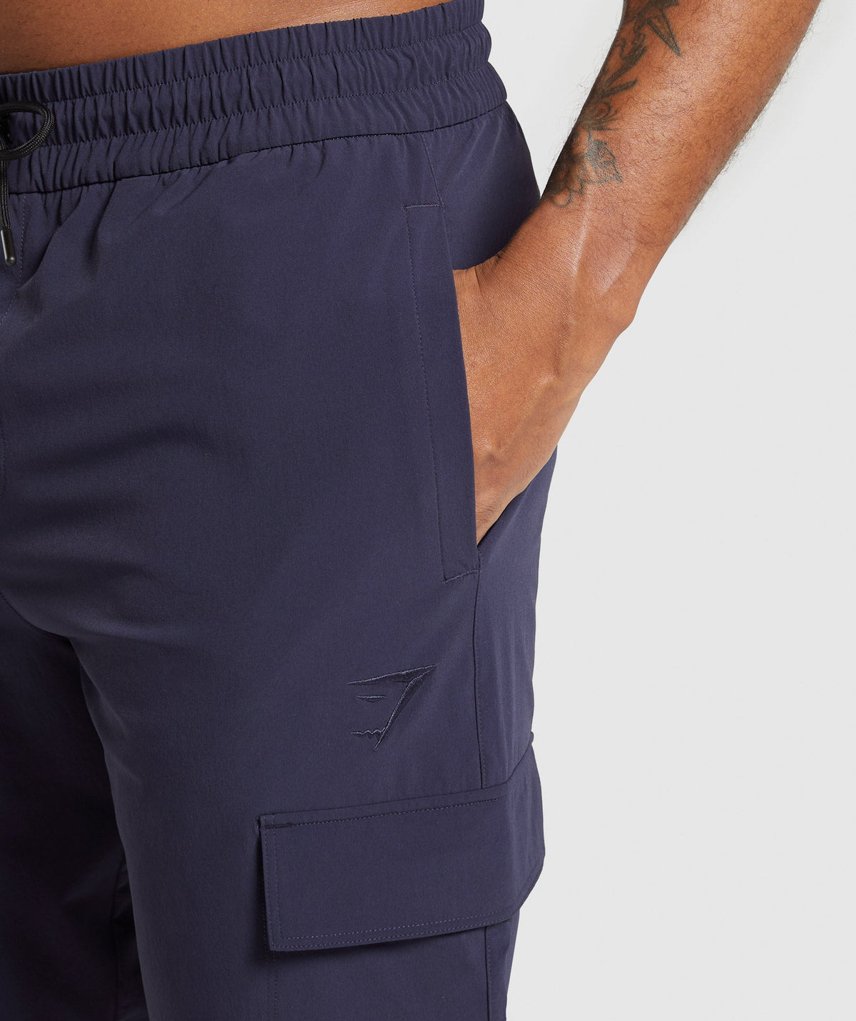 gymshark-stretch-woven-cargo-pants-pants-blue-ss25