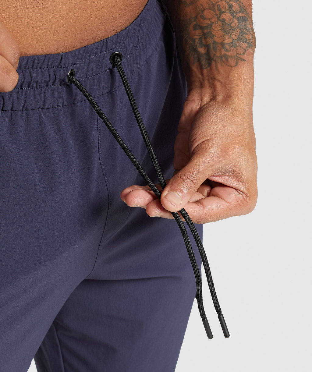 gymshark-stretch-woven-cargo-pants-pants-blue-ss25