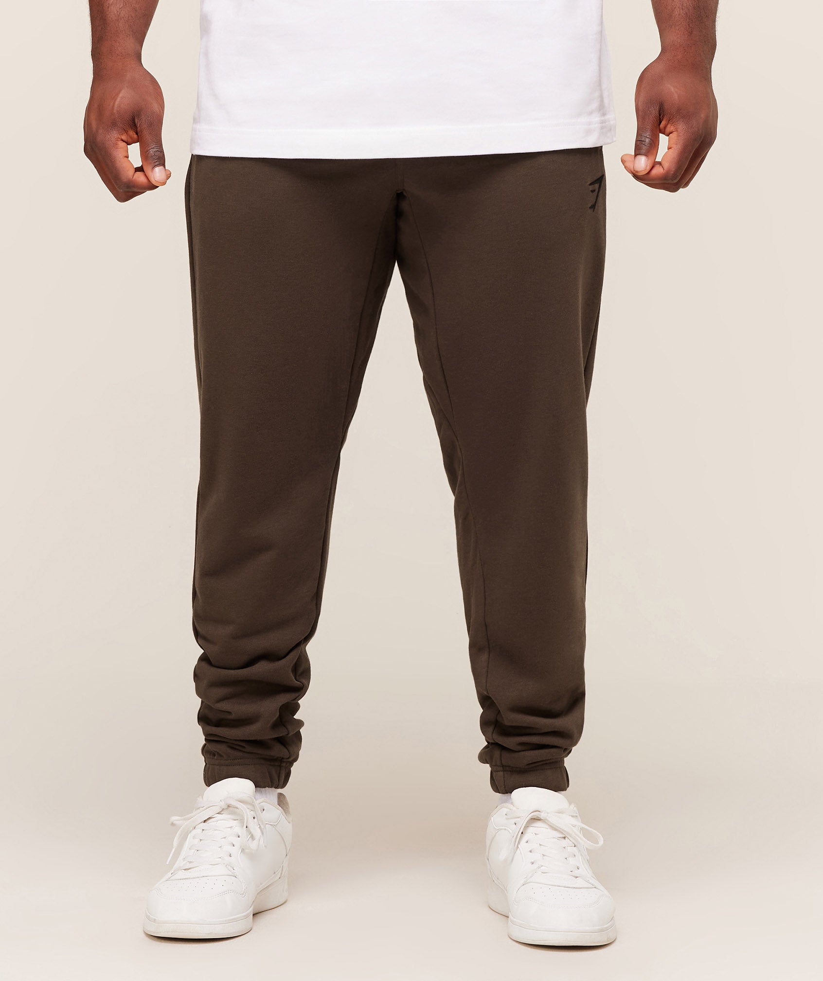 gymshark-essential-oversized-joggers-pants-brown-aw25