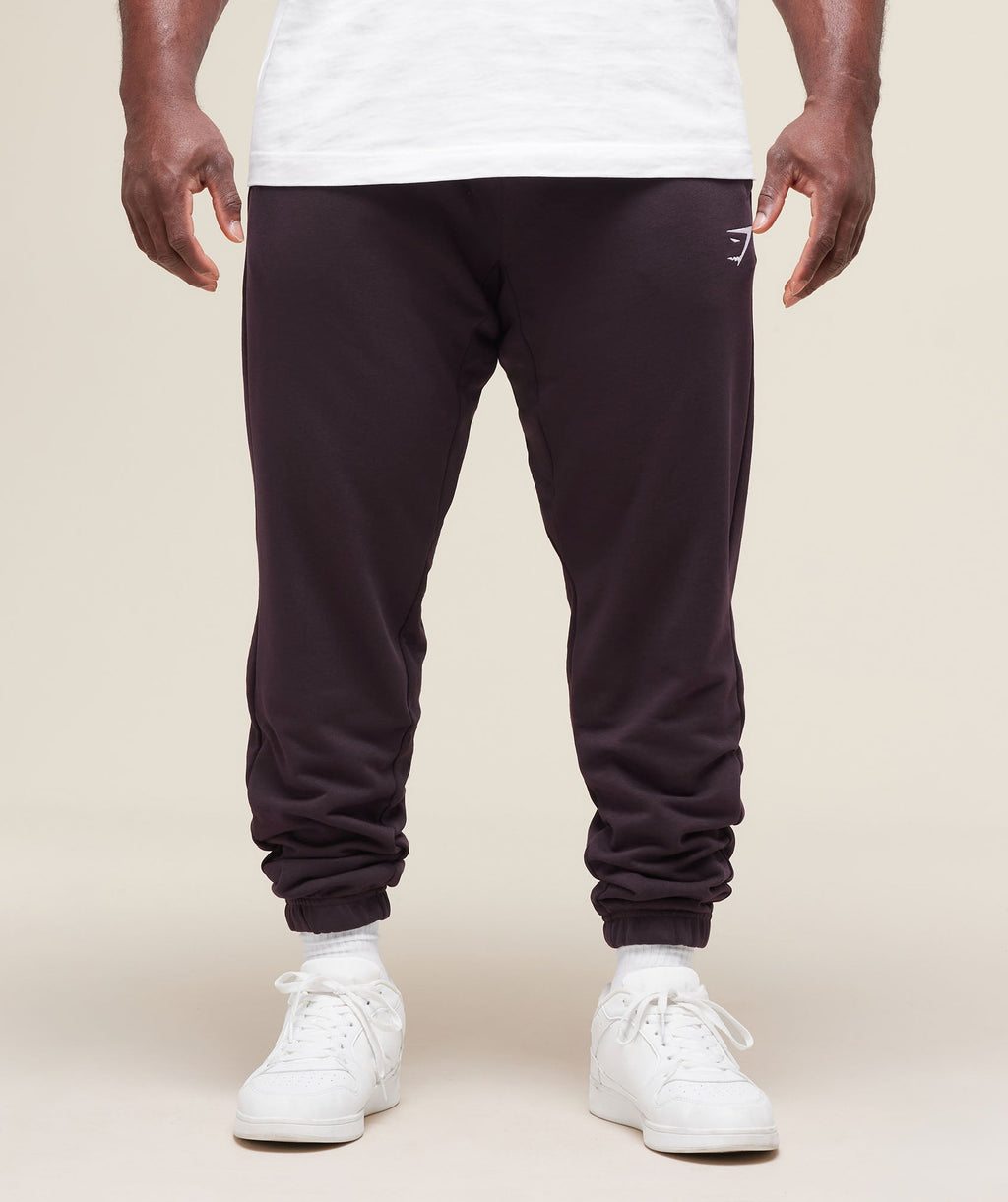 gymshark-essential-oversized-joggers-plum-brown-ss25