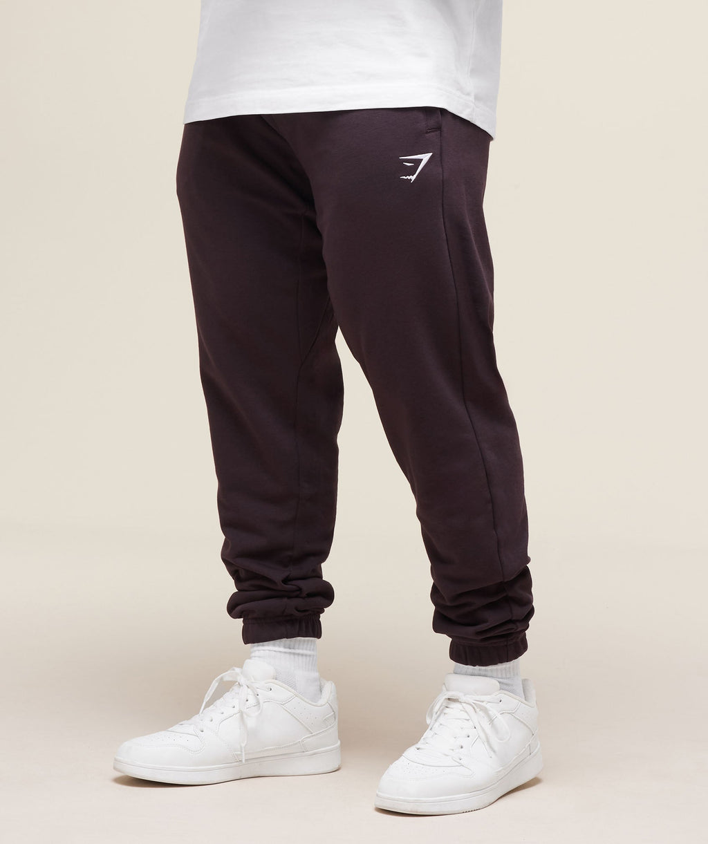 gymshark-essential-oversized-joggers-plum-brown-ss25