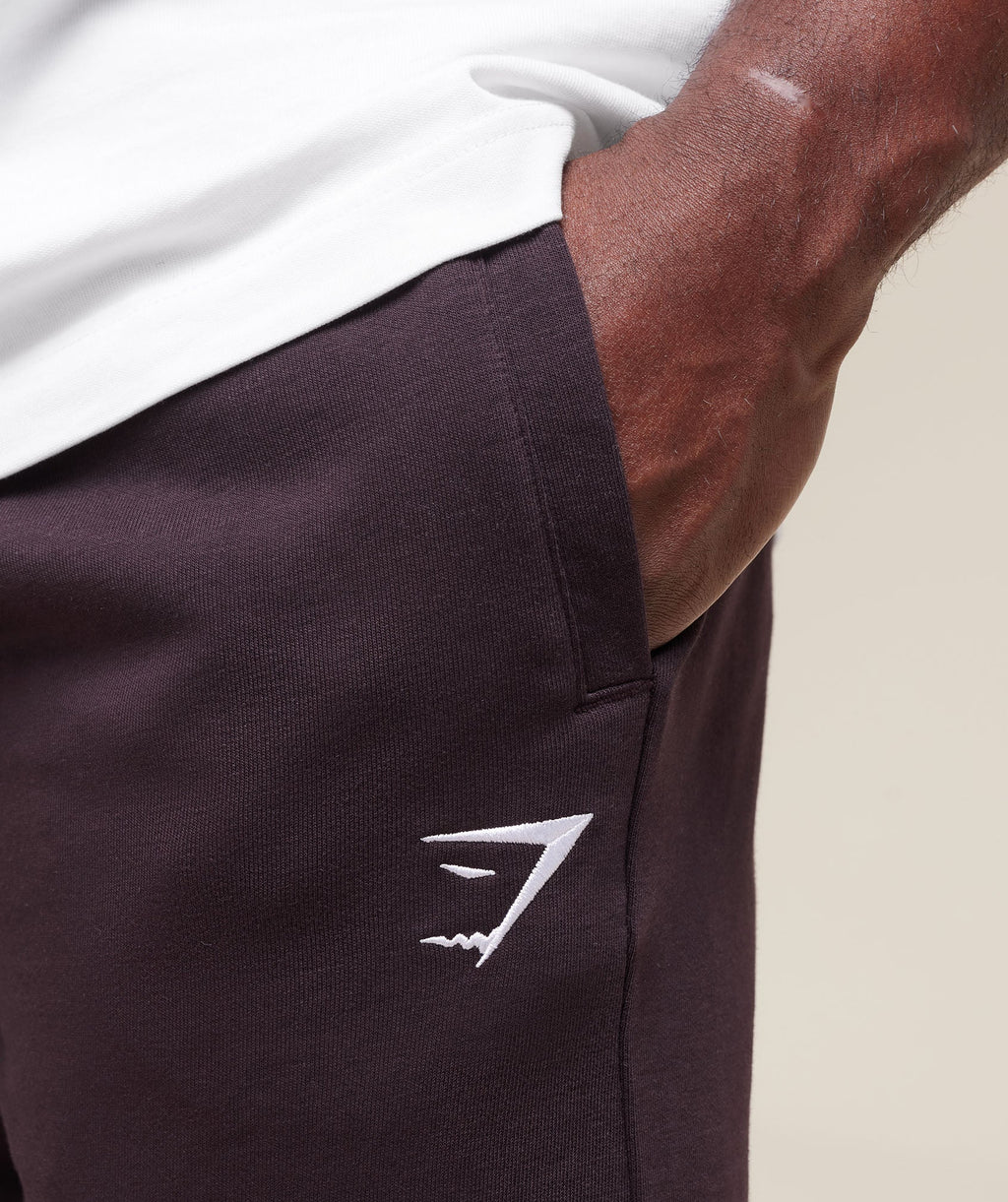 gymshark-essential-oversized-joggers-plum-brown-ss25