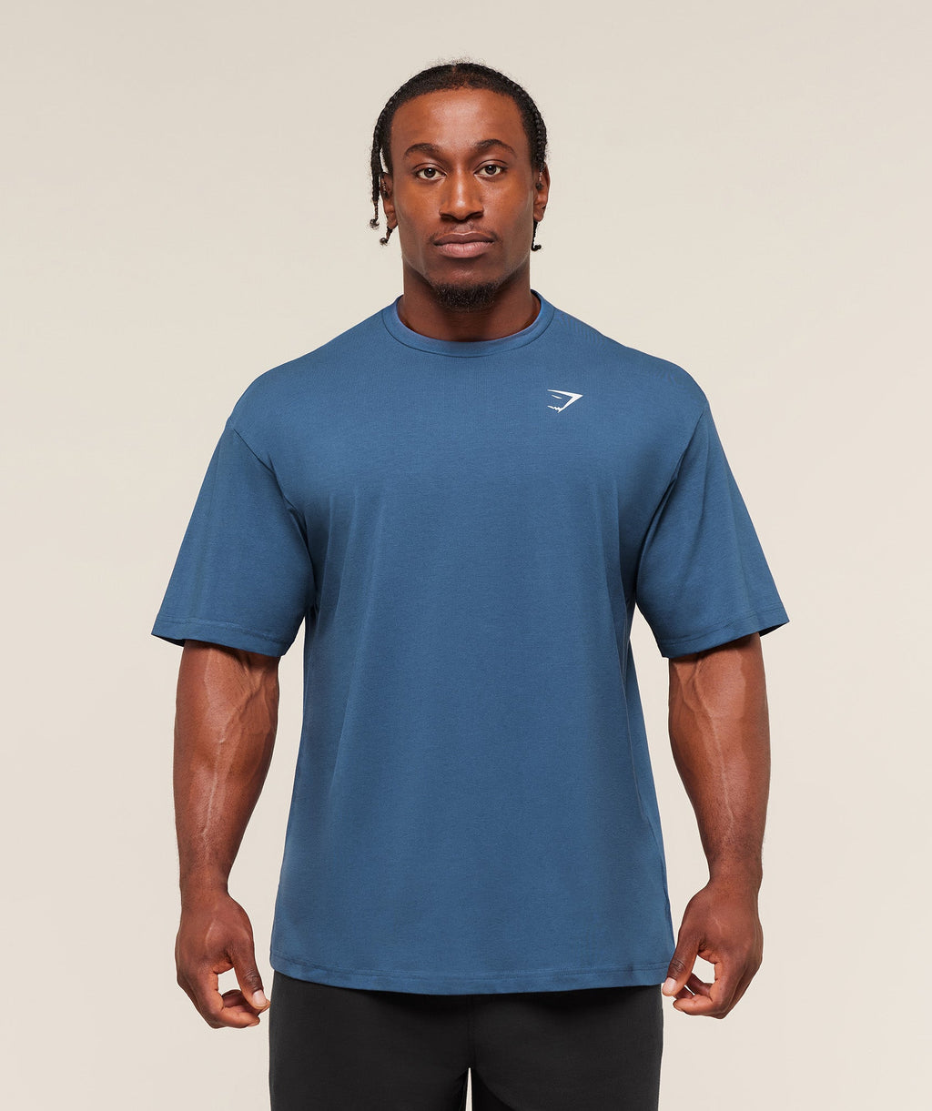 gymshark-essential-oversized-t-shirt-ss-tops-blue-aw25