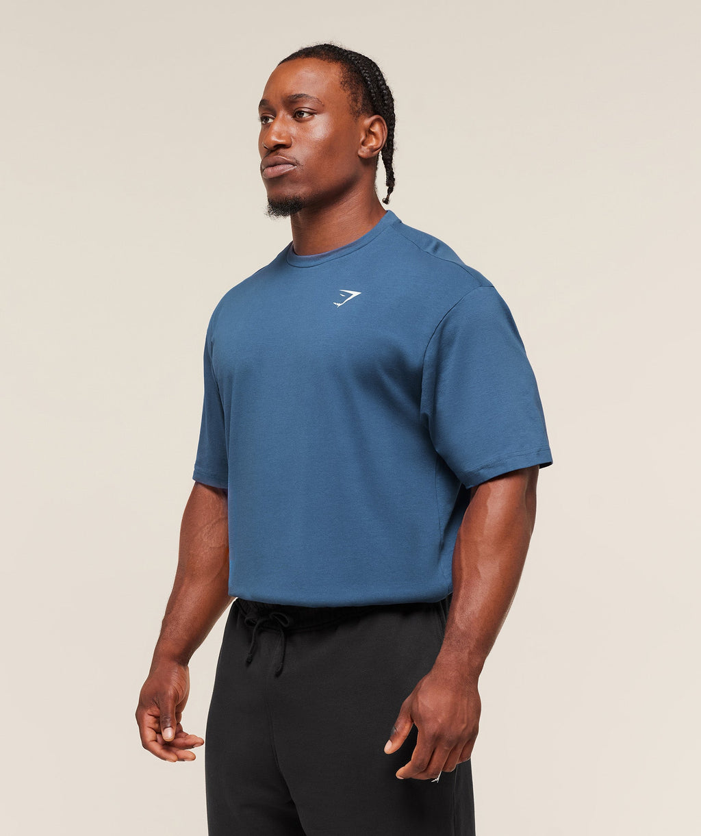 gymshark-essential-oversized-t-shirt-ss-tops-blue-aw25