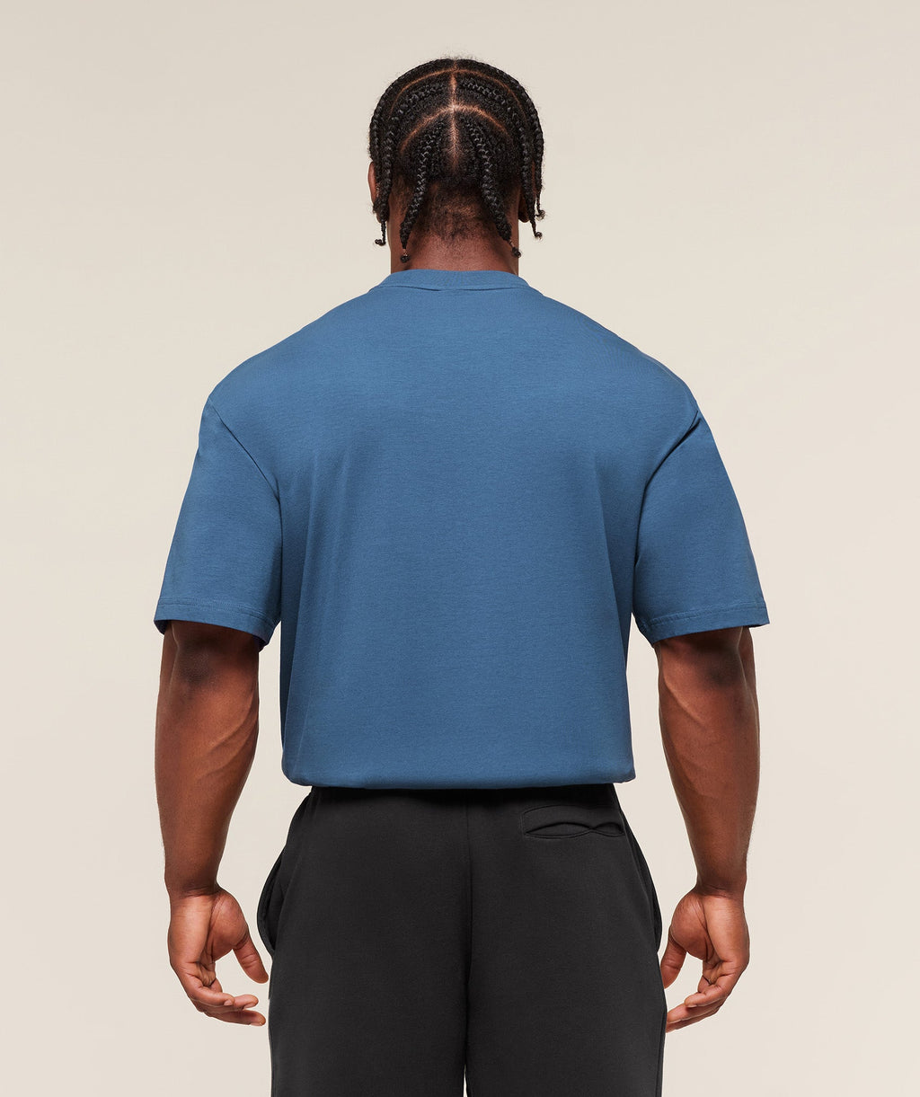 gymshark-essential-oversized-t-shirt-ss-tops-blue-aw25