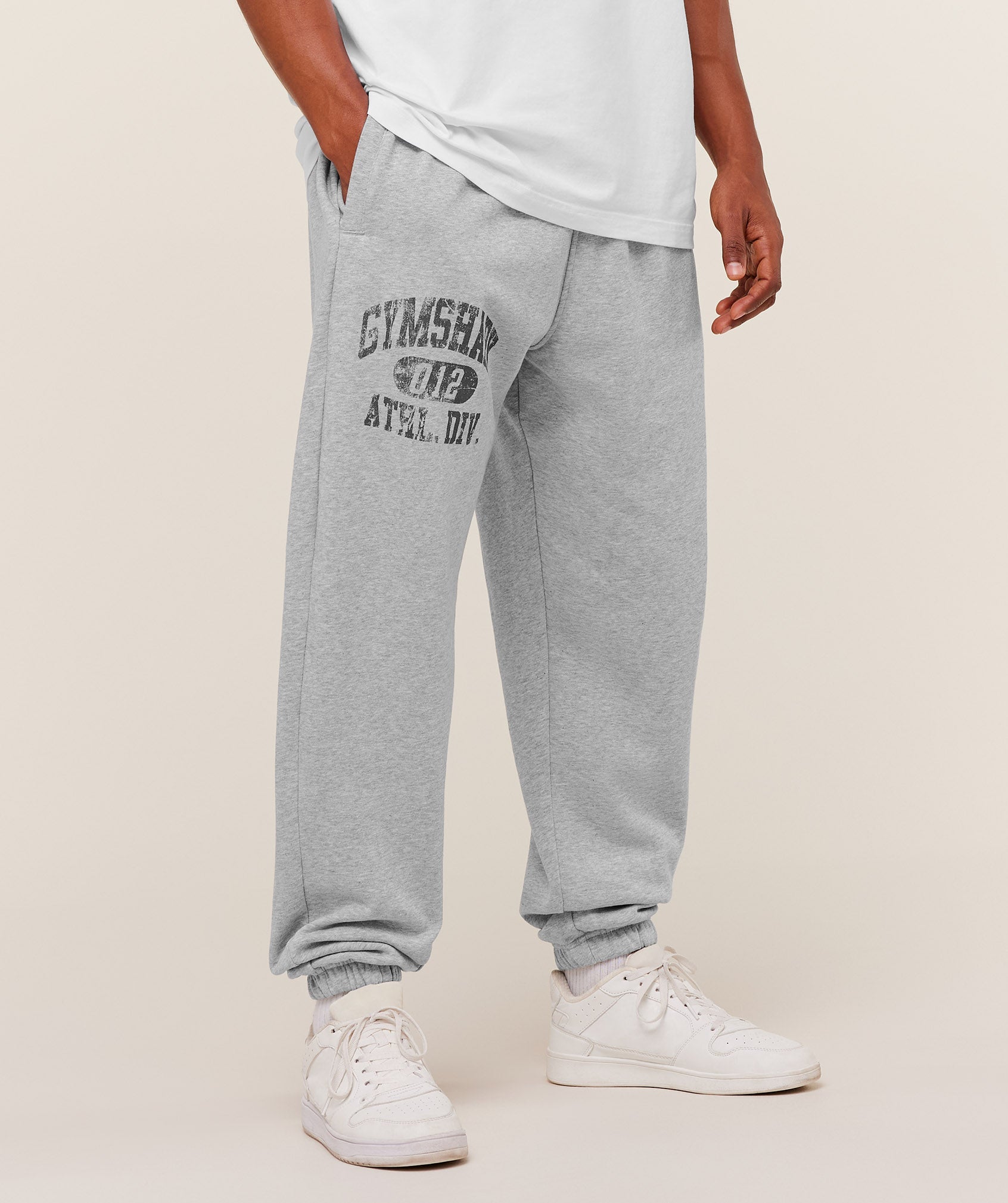 gymshark-athletic-division-graphic-jogger-pants-grey-ss26