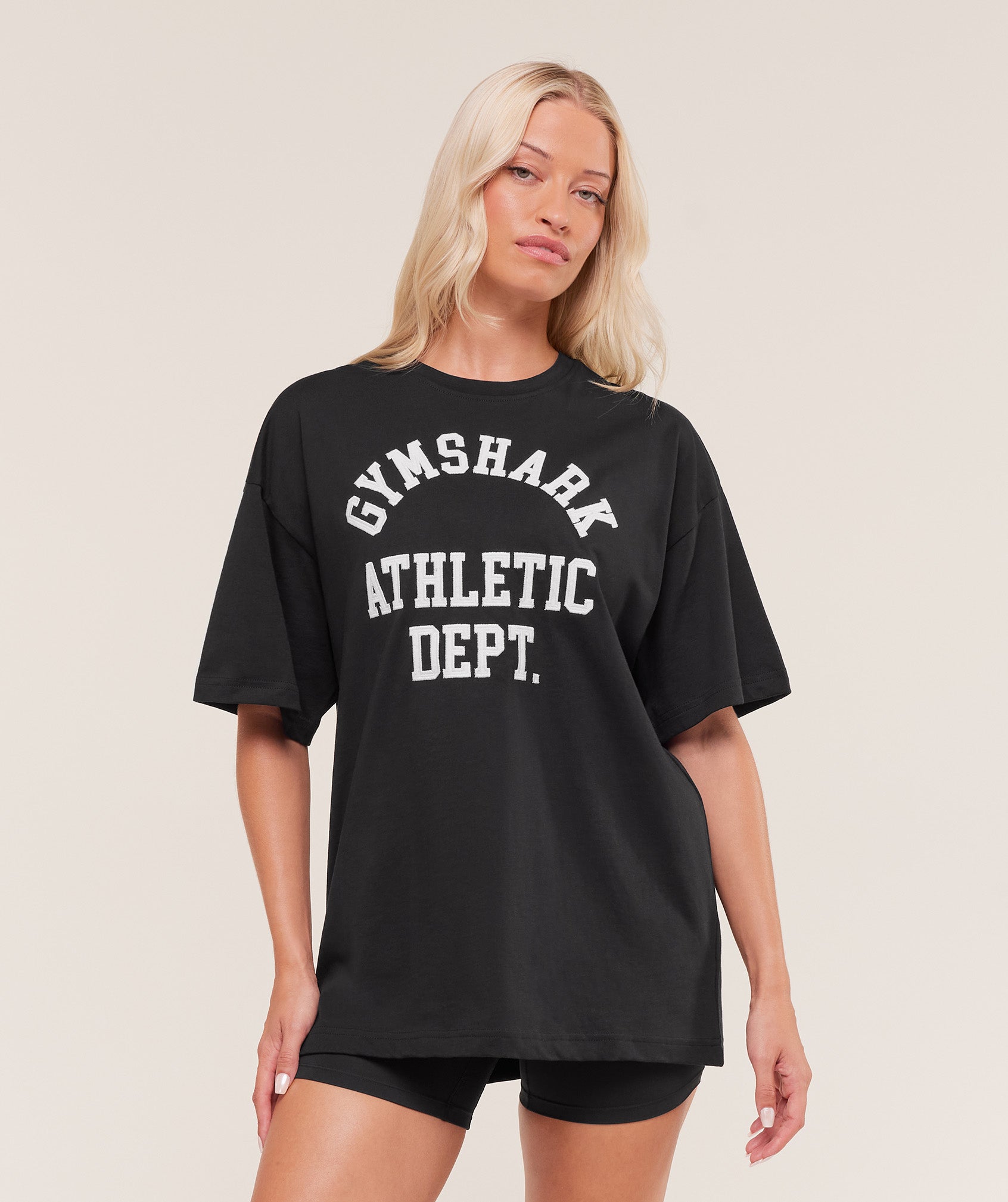 gymshark-athletic-department-oversized-graphic-t-shirt-ss-tops-black-aw25