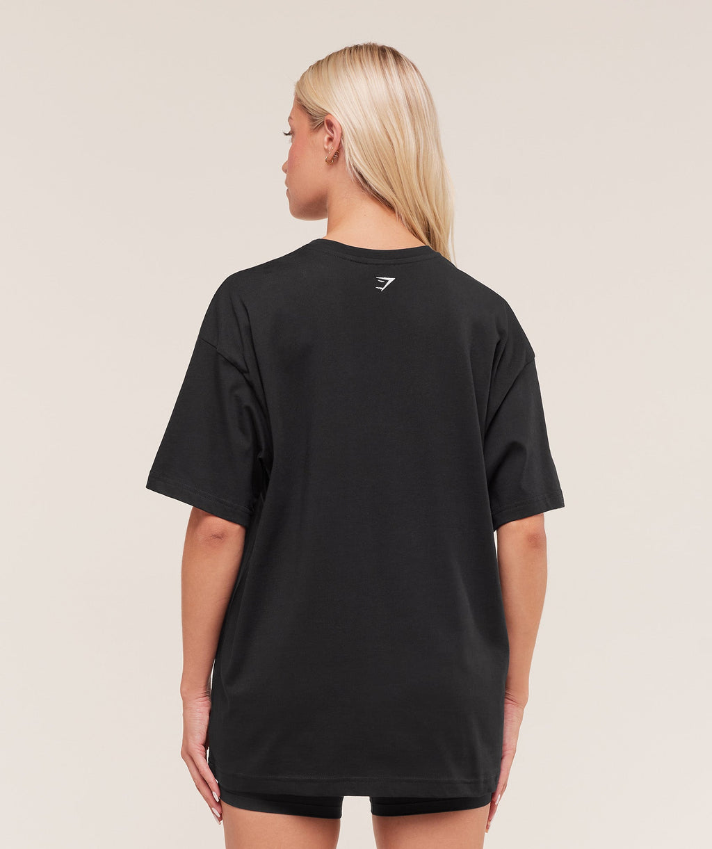 gymshark-athletic-department-oversized-graphic-t-shirt-ss-tops-black-aw25