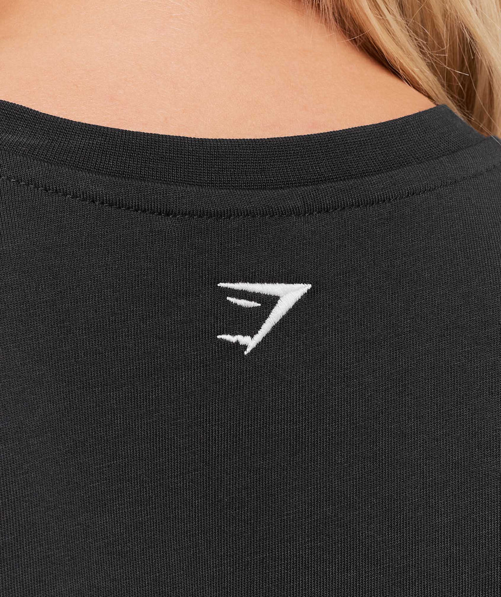 gymshark-athletic-department-oversized-graphic-t-shirt-ss-tops-black-aw25
