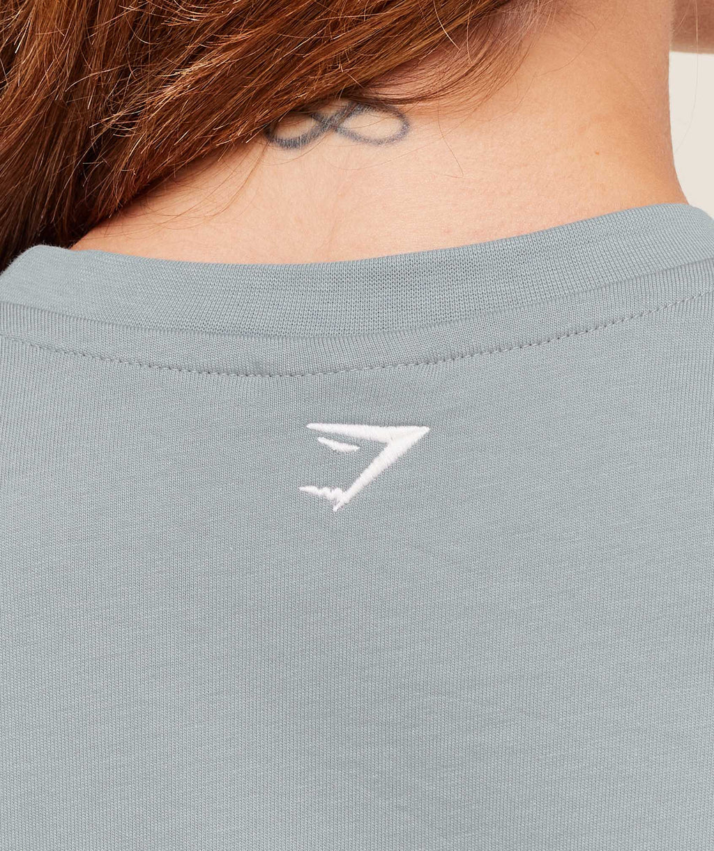 gymshark-athletic-department-oversized-graphic-t-shirt-ss-tops-grey-aw25