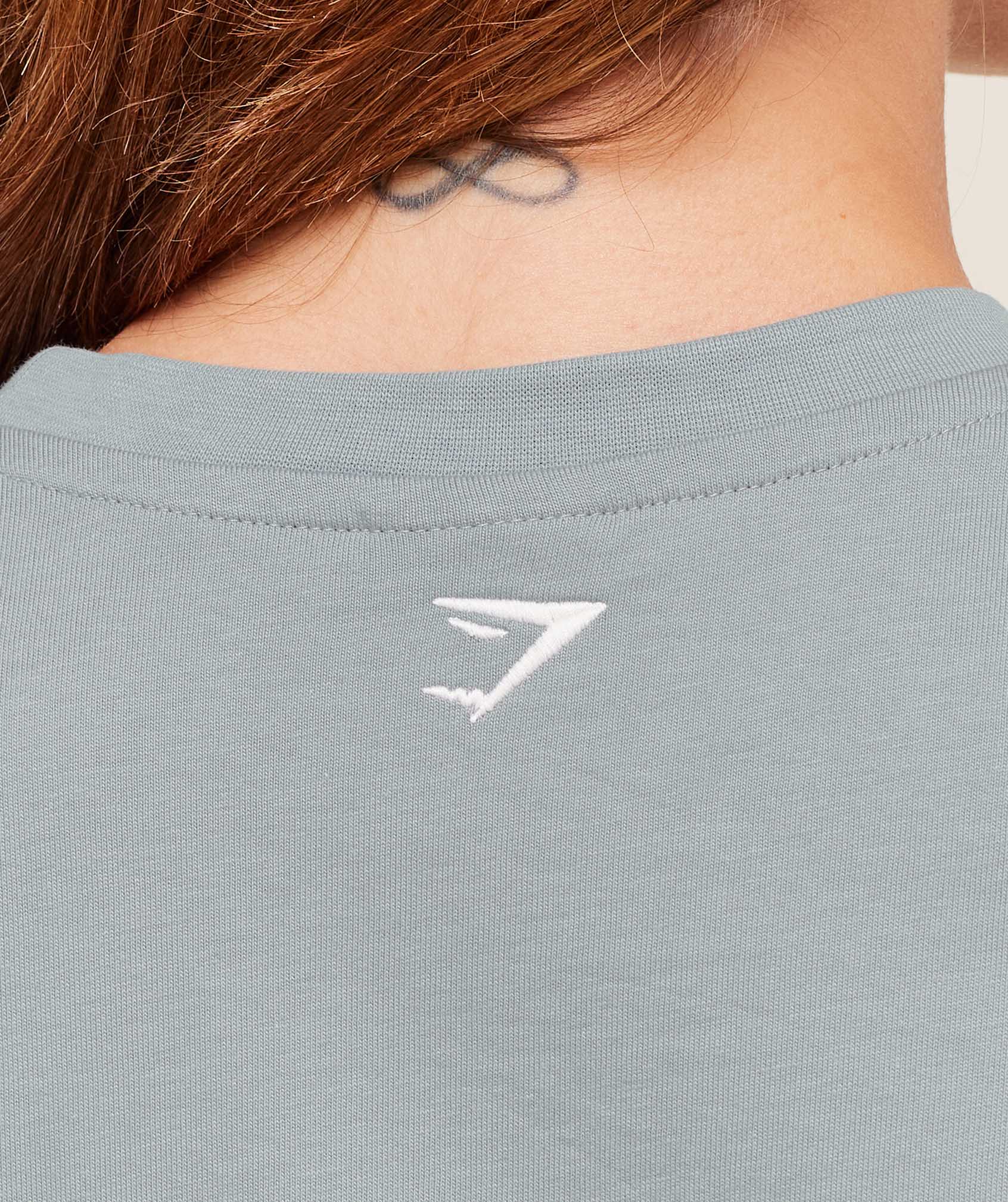 gymshark-athletic-department-oversized-graphic-t-shirt-ss-tops-grey-aw25