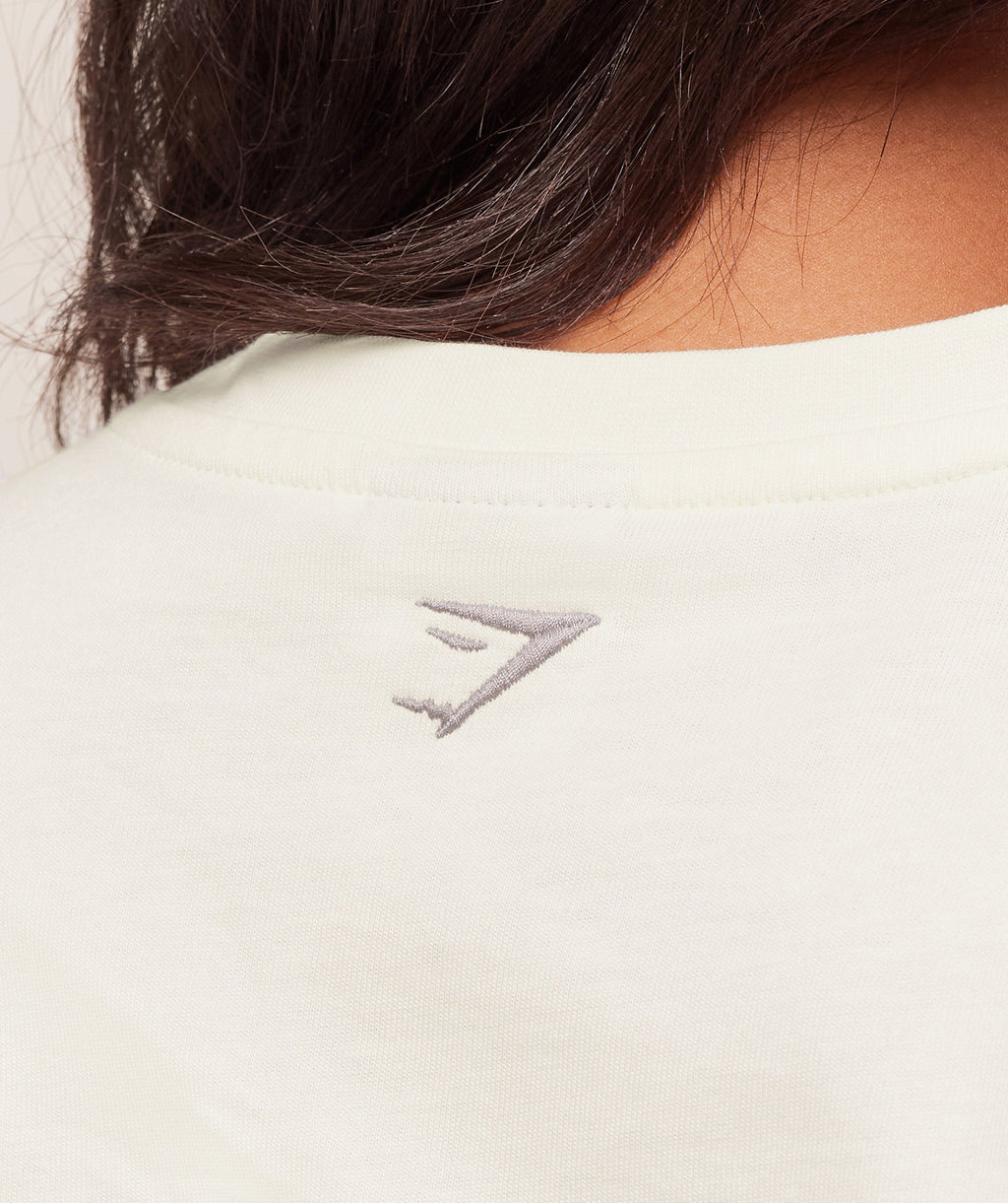 gymshark-athletic-department-oversized-graphic-t-shirt-ss-tops-white-aw25
