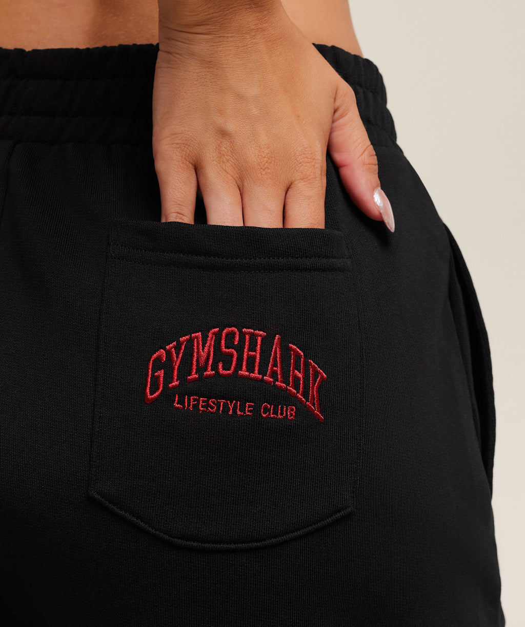 gymshark-collegiate-graphic-short-shorts-black-aw25