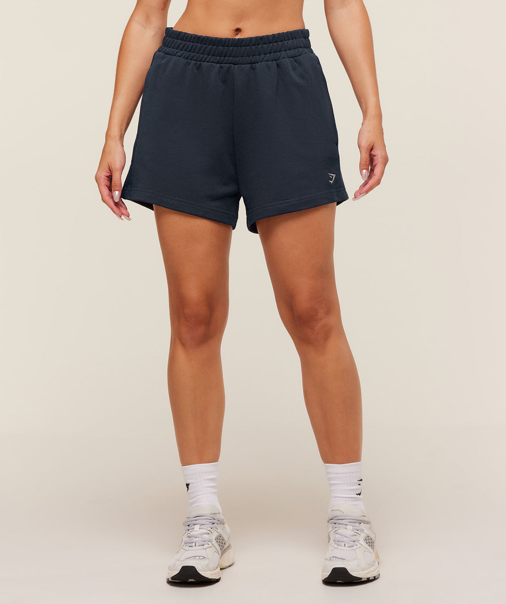gymshark-collegiate-graphic-short-shorts-blue-aw25