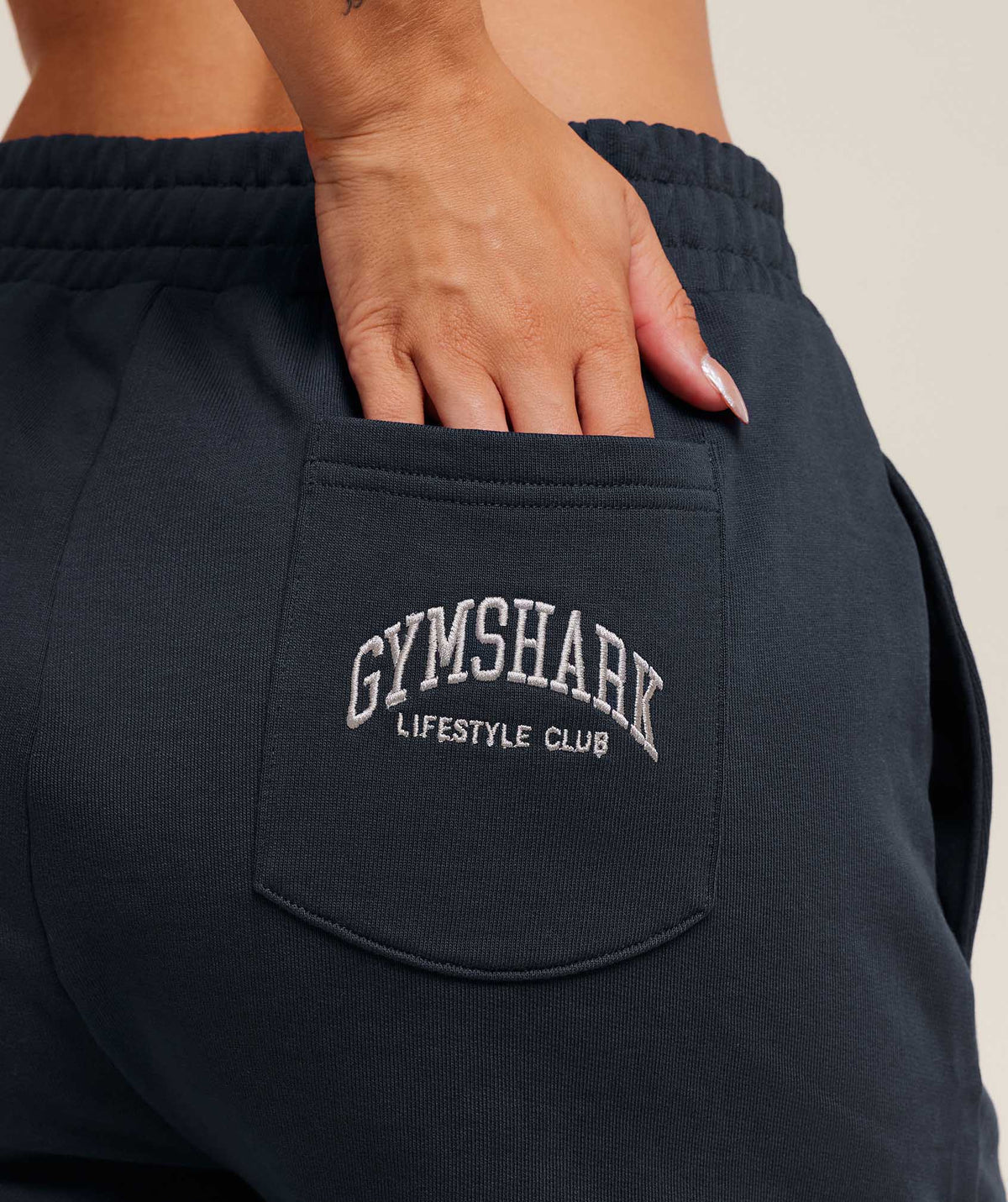 gymshark-collegiate-graphic-short-shorts-blue-aw25