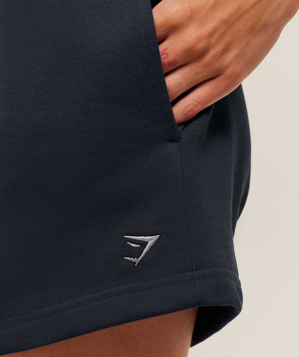 gymshark-collegiate-graphic-short-shorts-blue-aw25
