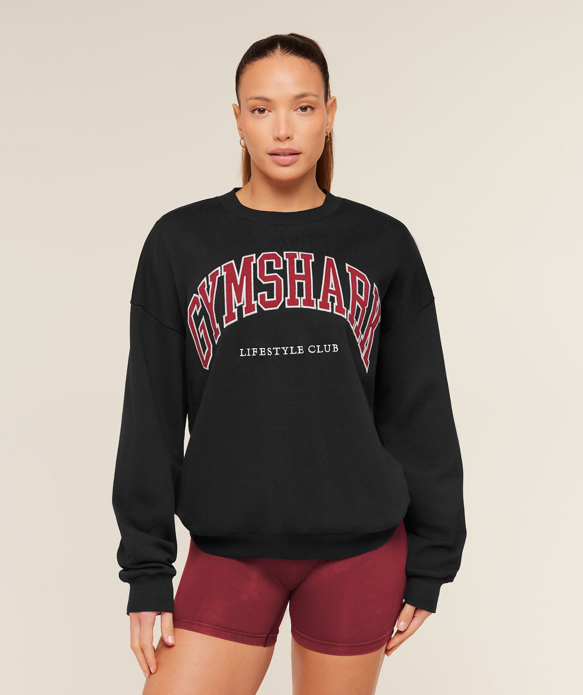 gymshark-collegiate-graphic-crew-neck-pullover-pullovers-black-aw25