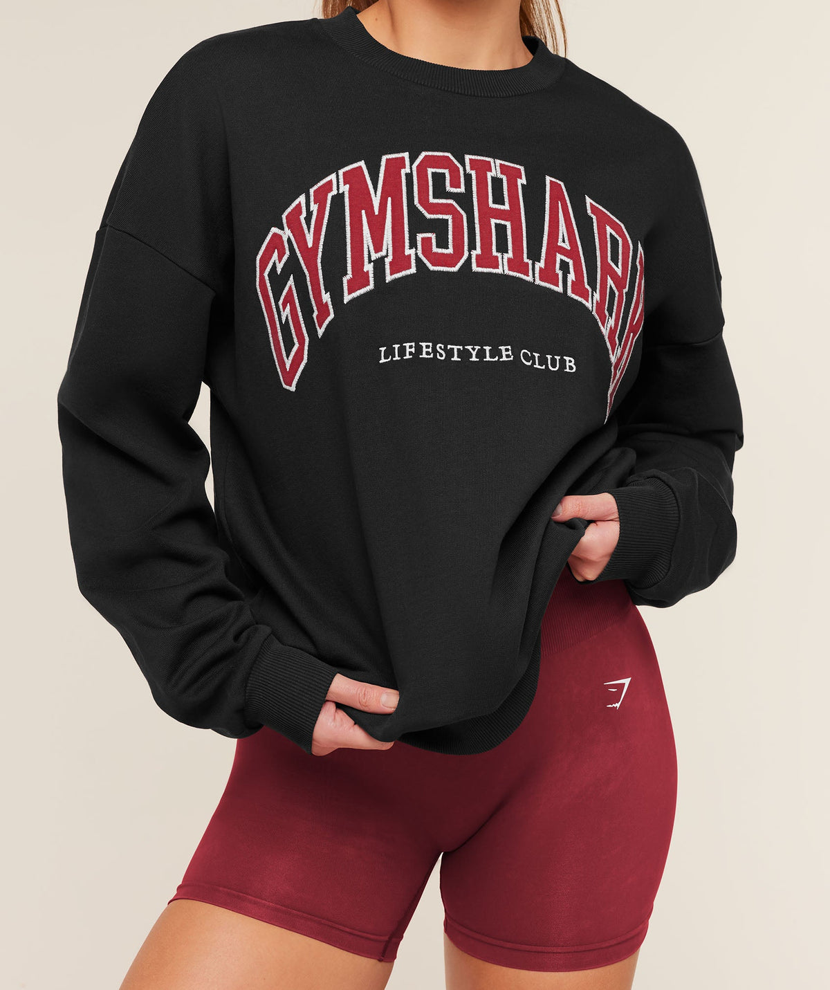 gymshark-collegiate-graphic-crew-neck-pullover-pullovers-black-aw25