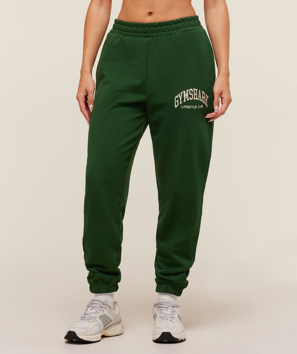 gymshark-collegiate-graphic-joggers-pants-green-aw25
