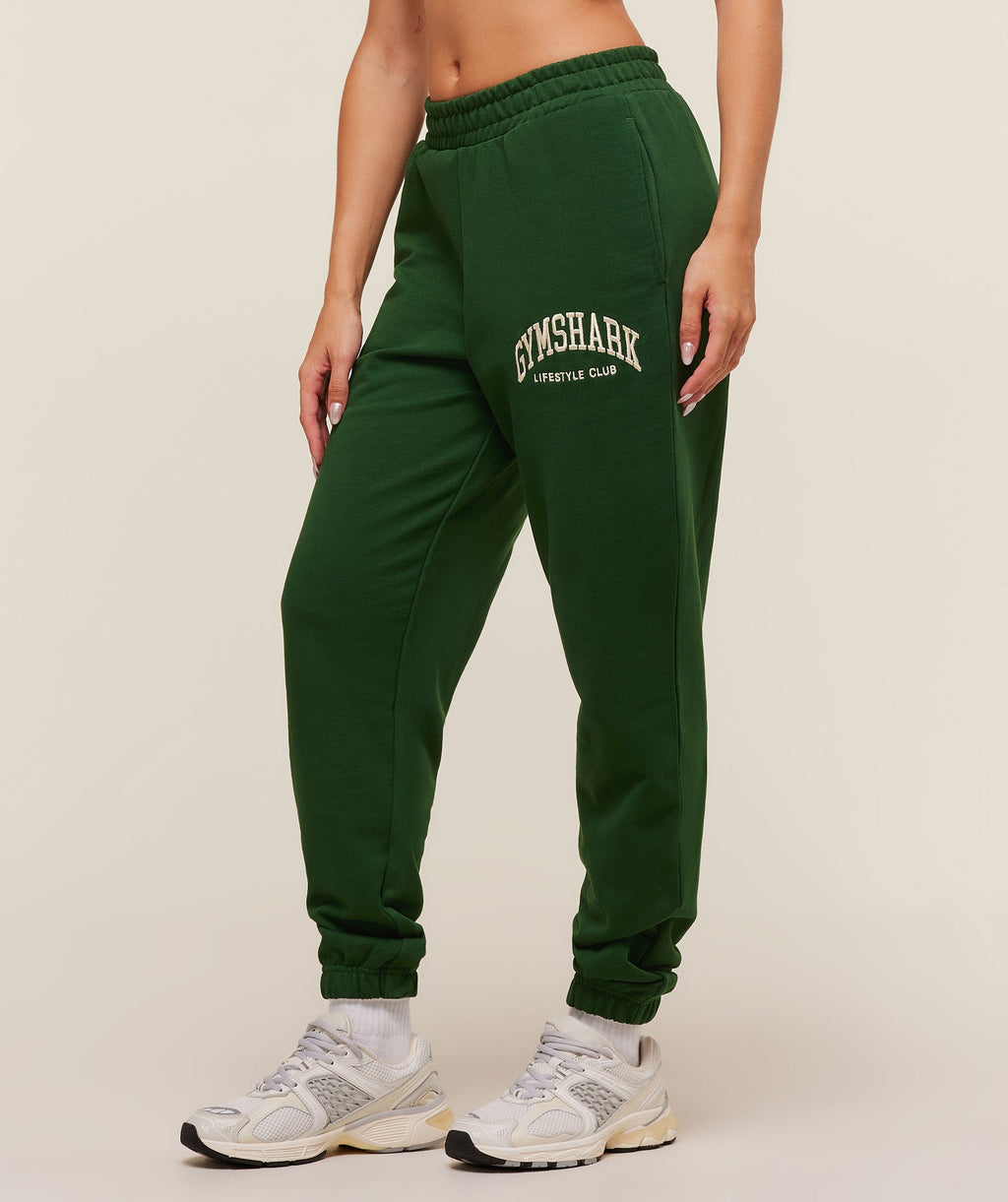 gymshark-collegiate-graphic-joggers-pants-green-aw25