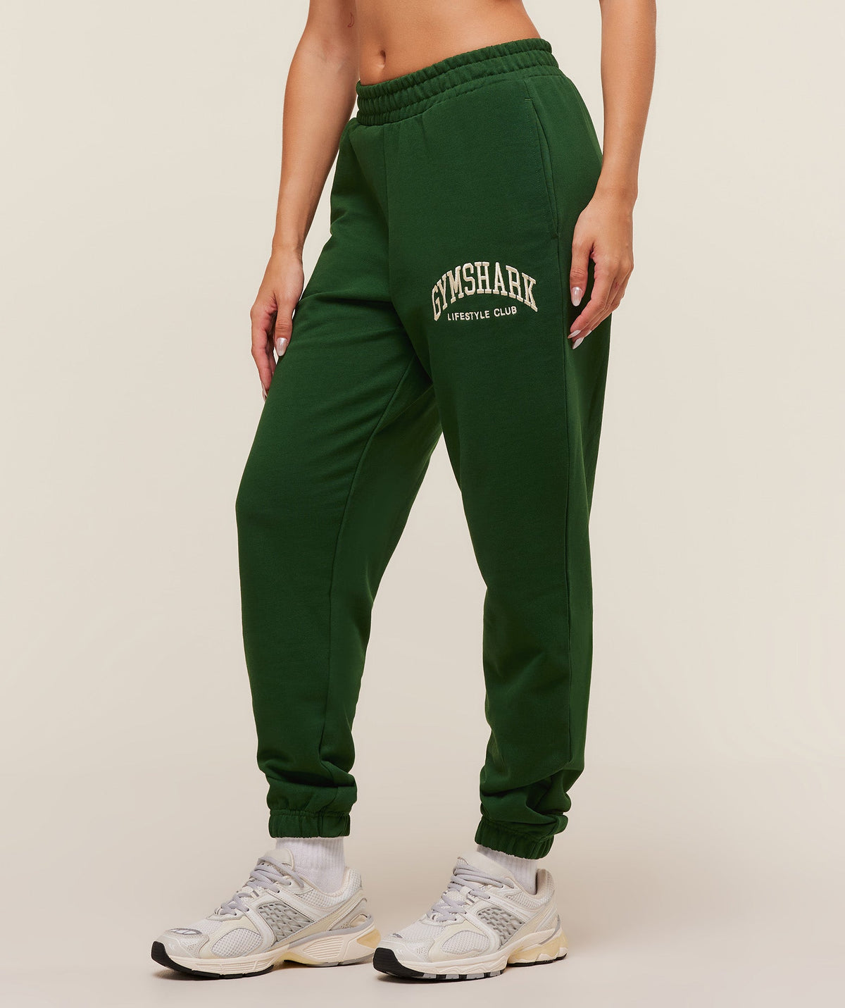 gymshark-collegiate-graphic-joggers-pants-green-aw25