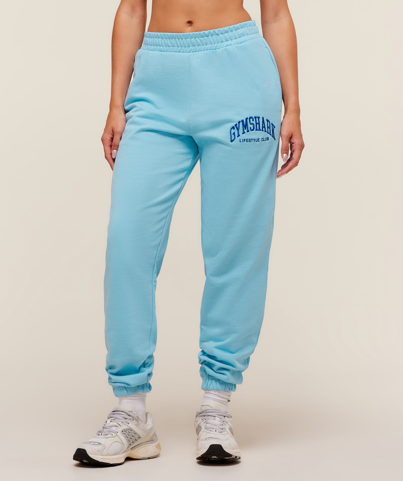 gymshark-collegiate-graphic-joggers-pants-blue-aw25