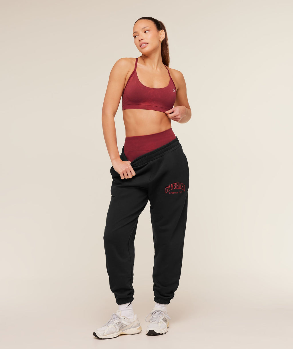 gymshark-collegiate-graphic-joggers-pants-black-aw25