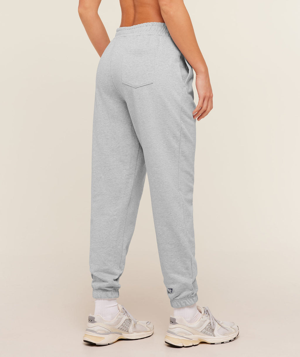 gymshark-collegiate-graphic-joggers-pants-grey-aw25