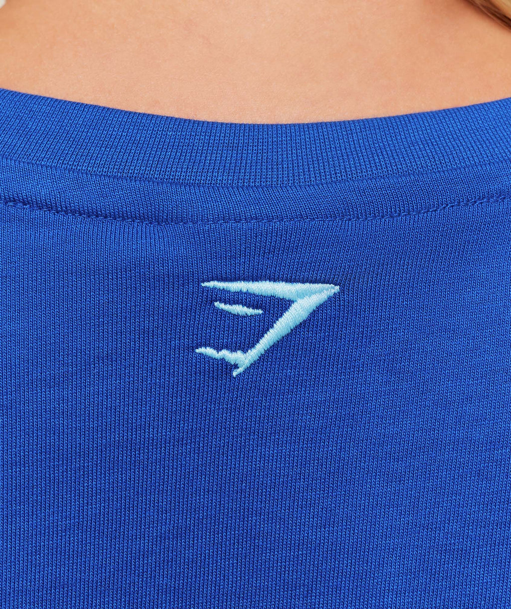 gymshark-collegiate-graphic-t-shirt-ss-tops-blue-aw25