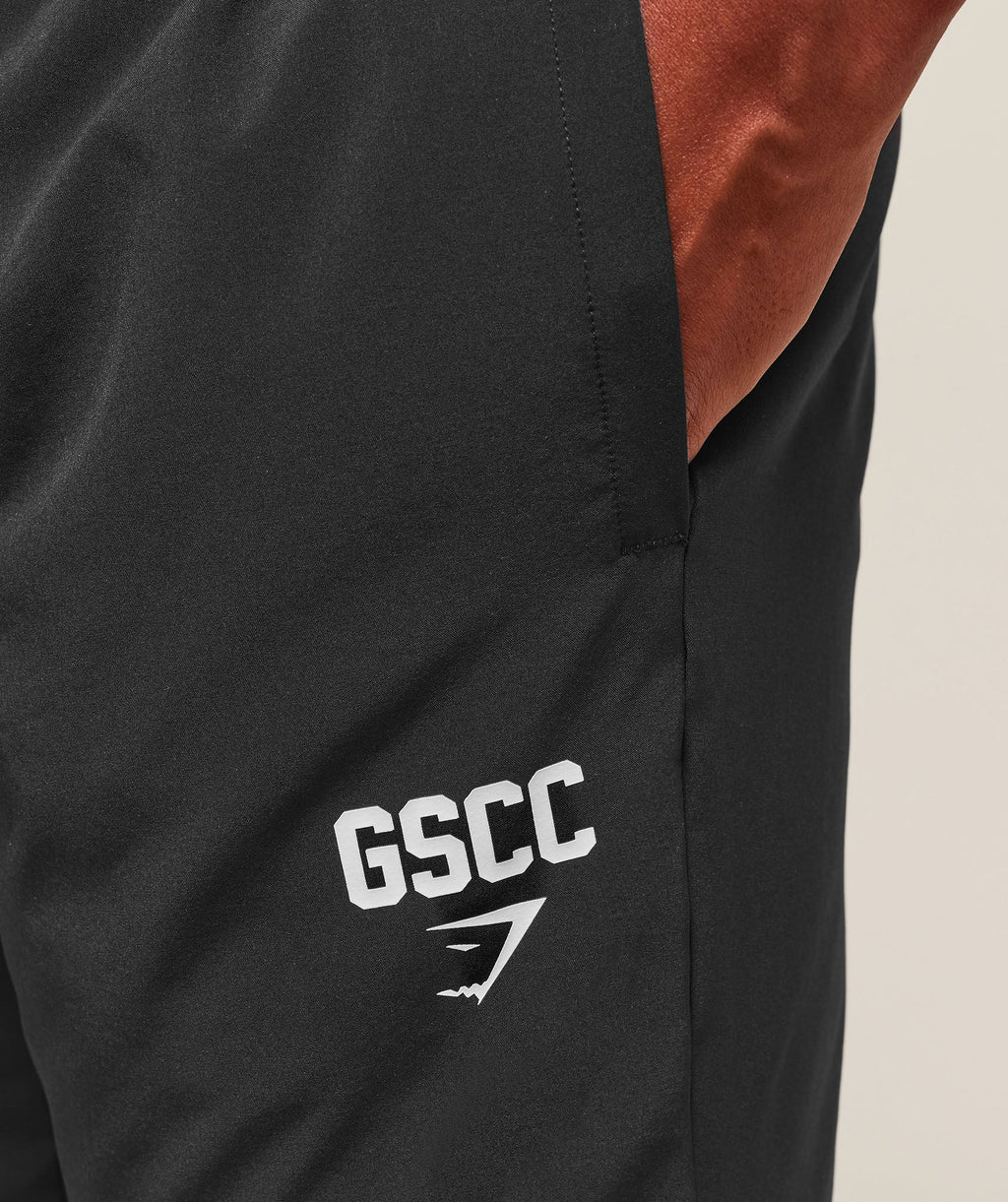 gymshark-hybrid-athlete-woven-joggers-pants-black-ss25