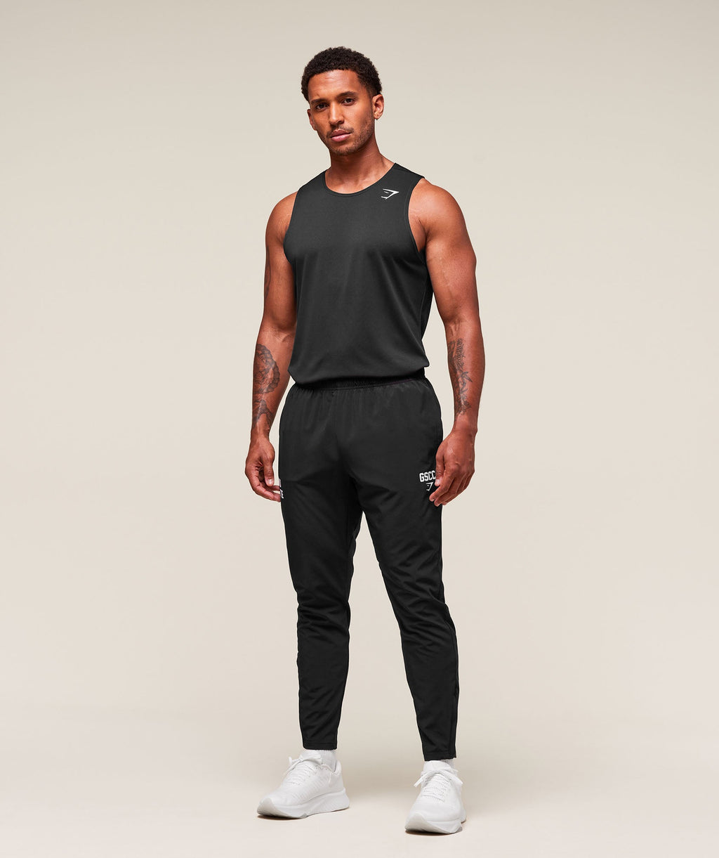 gymshark-hybrid-athlete-woven-joggers-pants-black-ss25