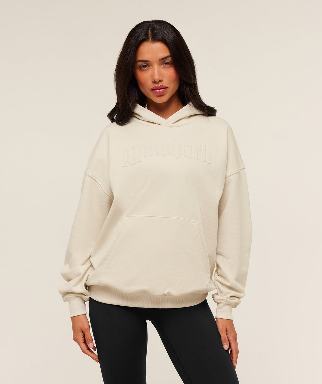 gymshark-embossed-graphic-oversized-hoodie-pullovers-white-aw25