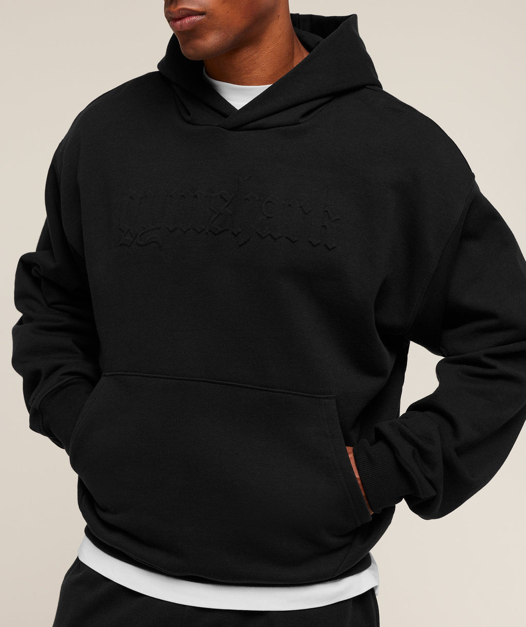 gymshark-embossed-boxy-hoodie-pullovers-black-aw25