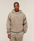 gymshark-embossed-boxy-hoodie-pullovers-brown-aw25