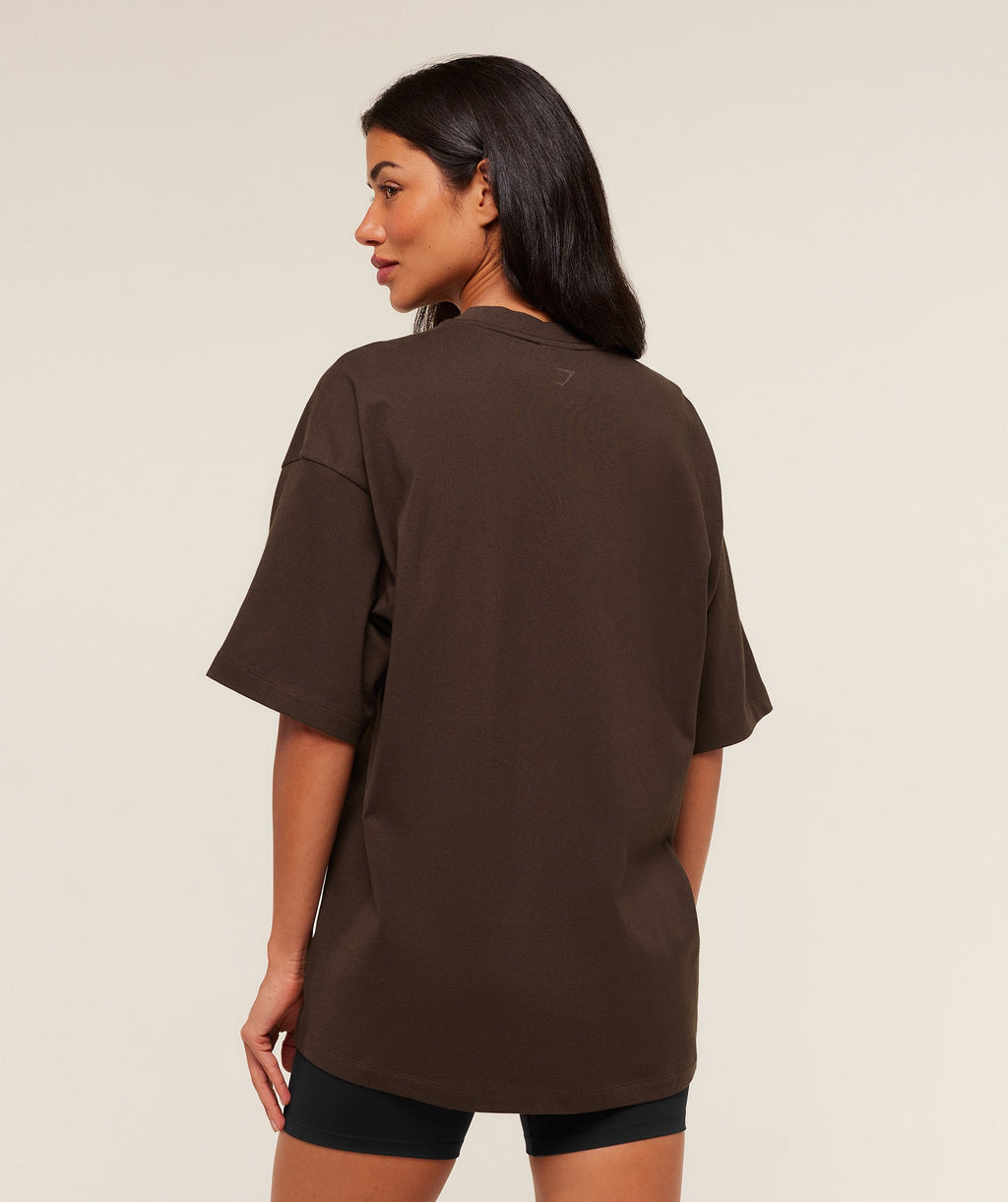 gymshark-embossed-graphic-oversized-t-shirt-ss-tops-brown-aw25